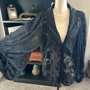 Shear black button up top. Sheer, needs a cami underneath